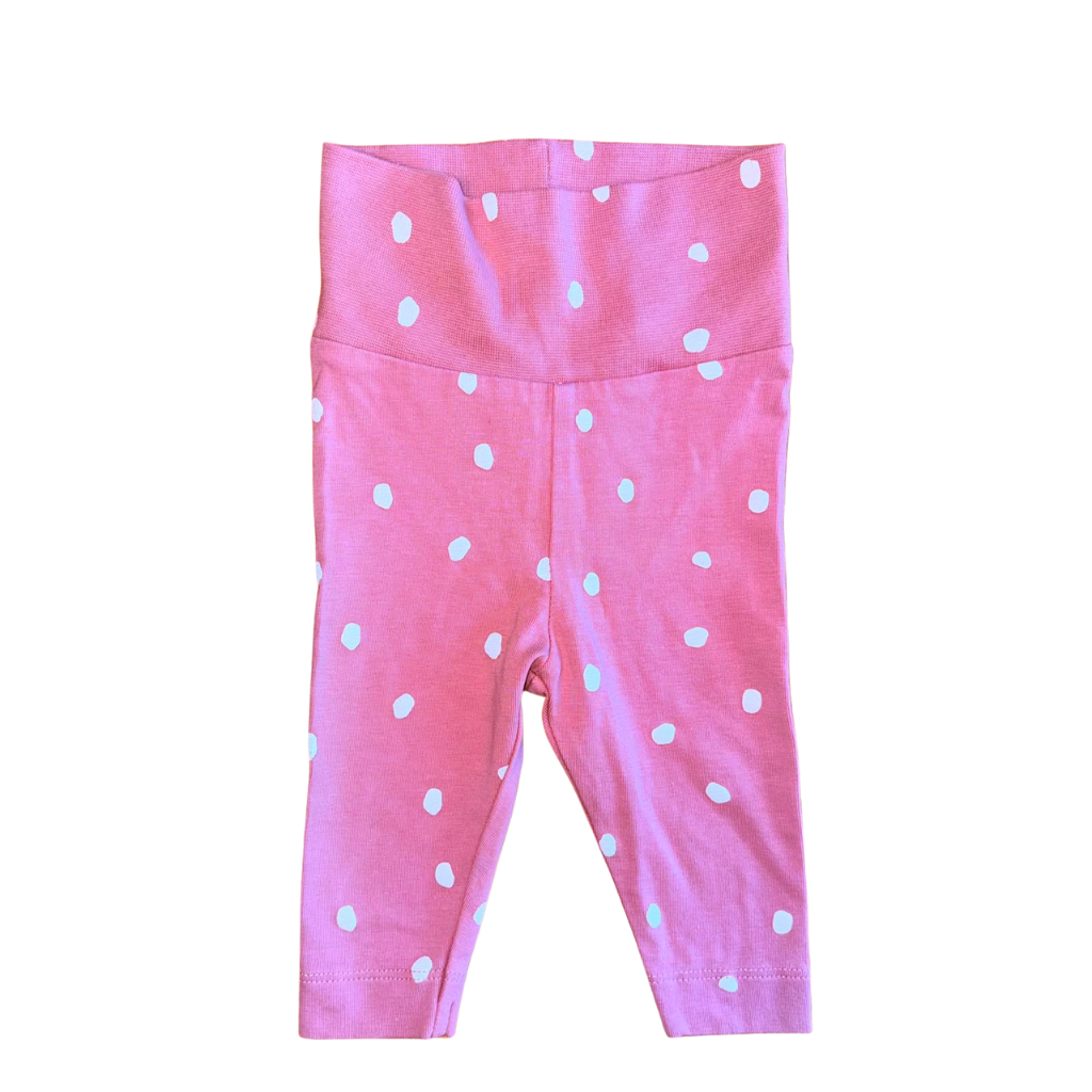 Calza rosa palo con diseño de putos blancos