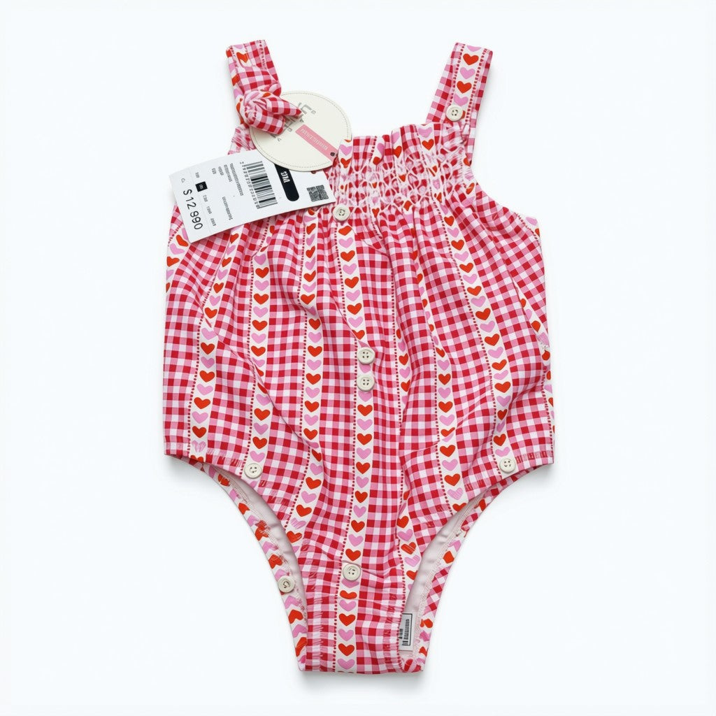 Traje de baño con etiqueta rosado con corazonces