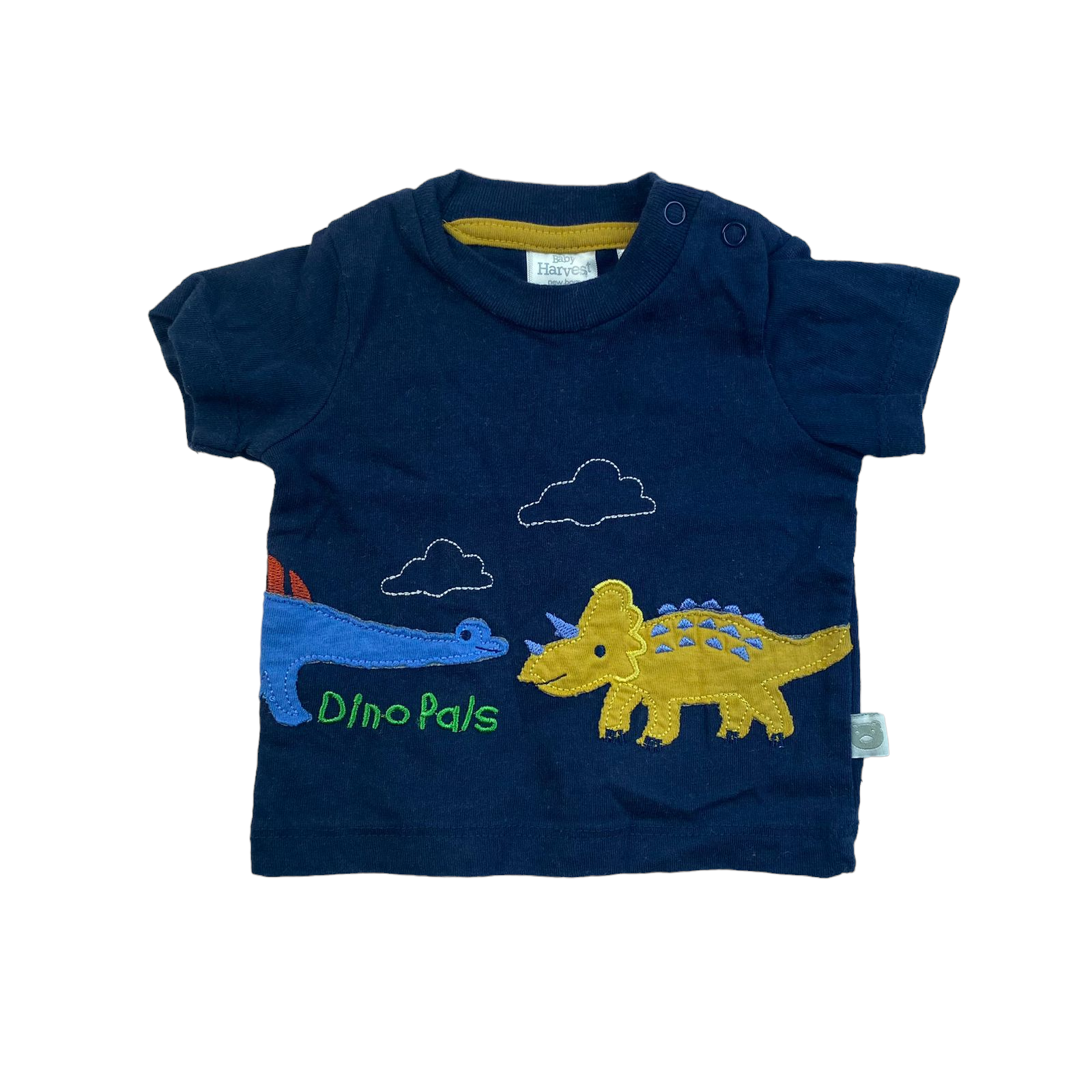 Polera azul oscuro con dinosaurios y nubes