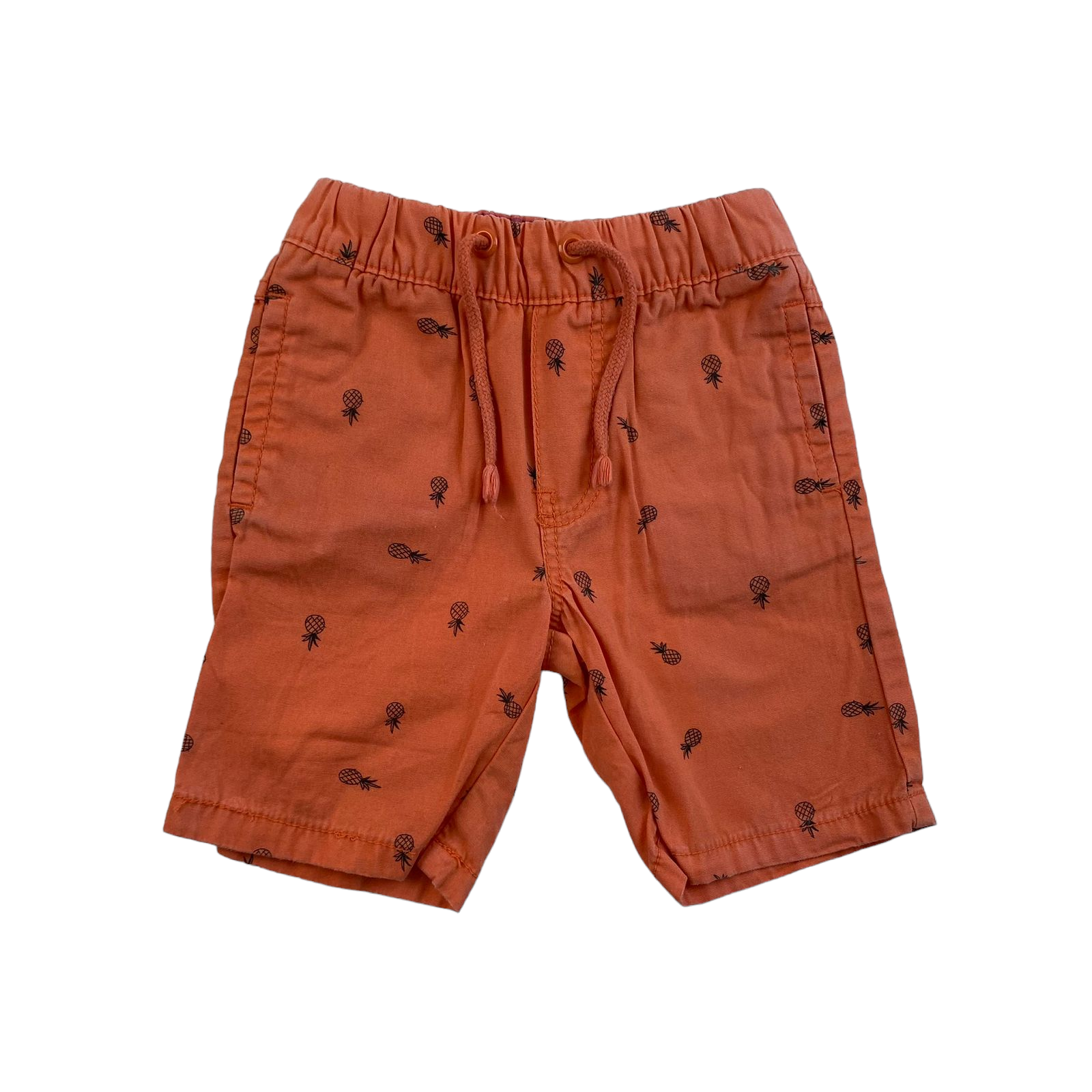 Short naranjo con piñas y cordones