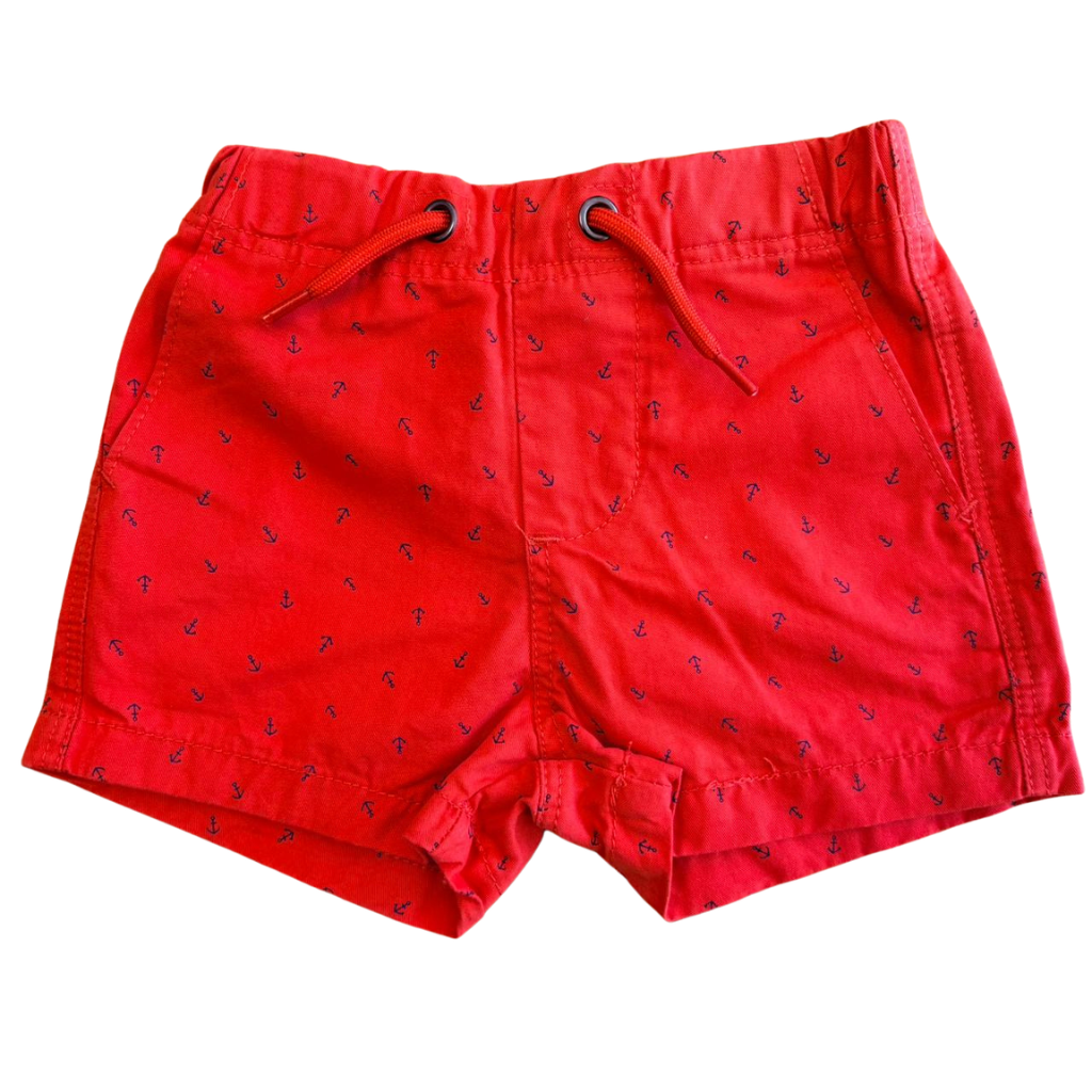 Short naranja con diseño de anclas