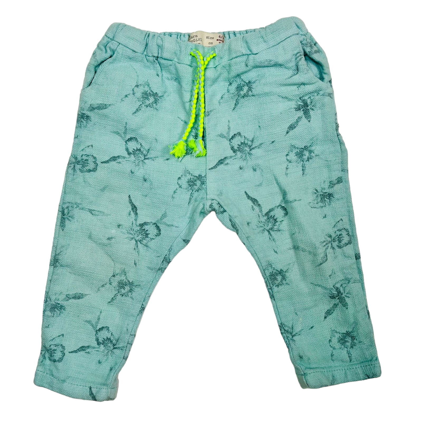 Pantalon turqueza con pretina y cordon verde neon diseño de flores