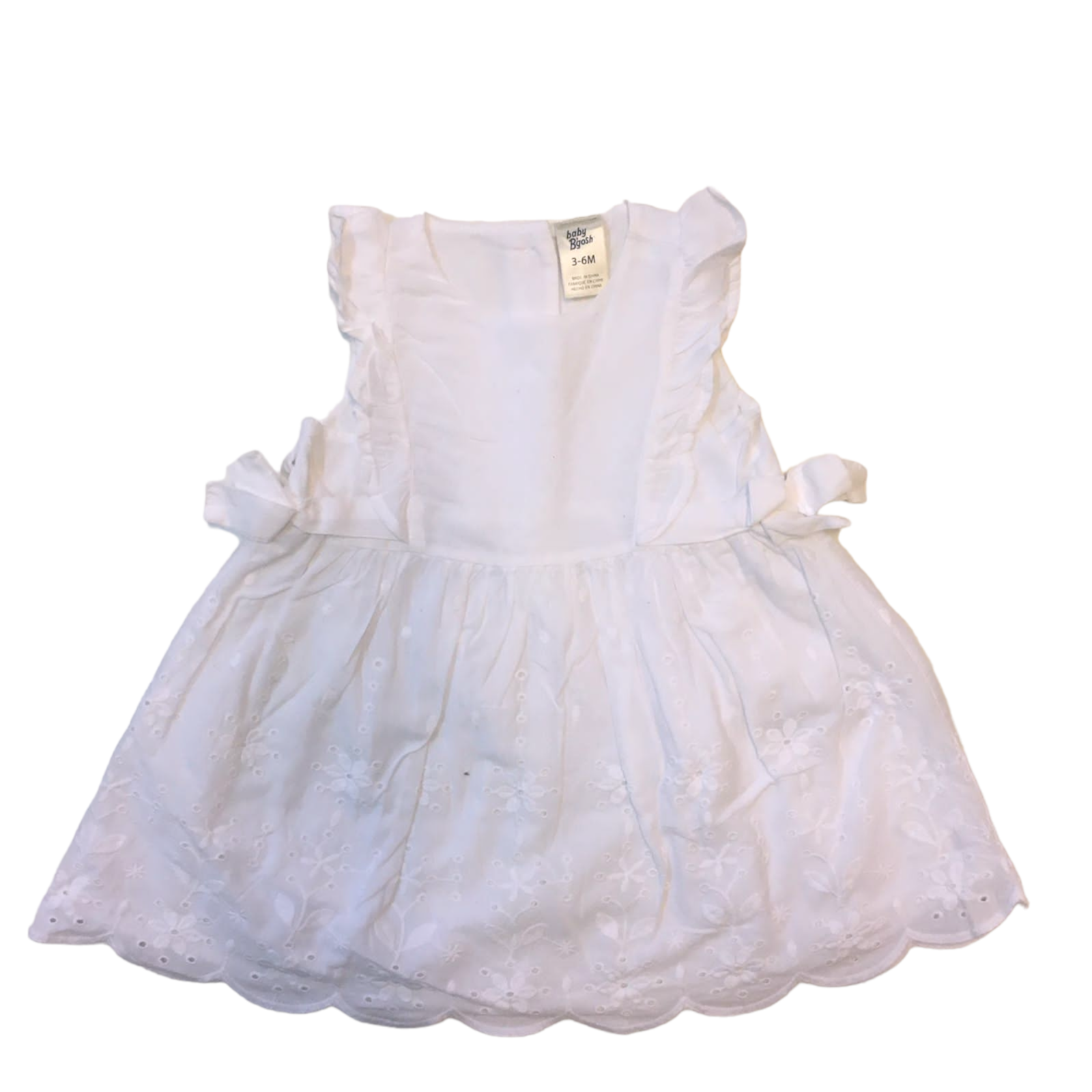 Vestido Oshkosh blanco con vuelitos y lazos