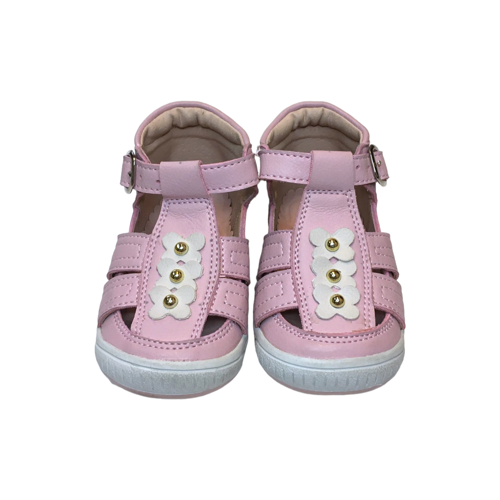 Zapatos rosados con flores blancas