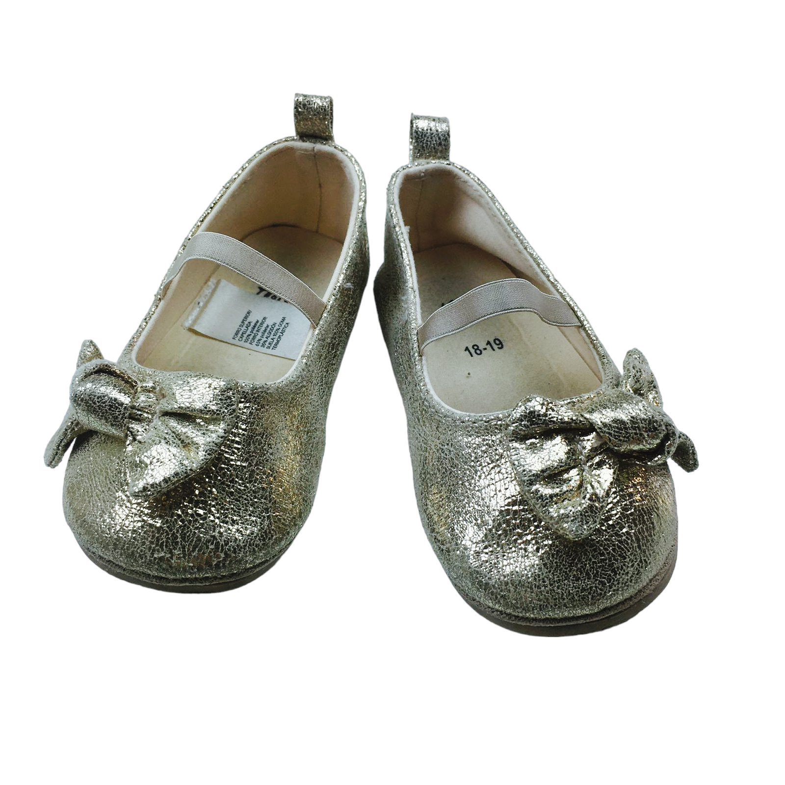 Ballerina dorada con lazo